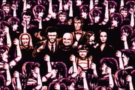 This scene takes place shortly after blowing up the UFO.  The adams family are in the middle of cheering people who are throwing their fists into the air in celebration.