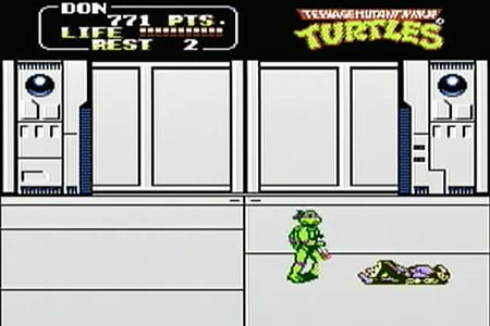 Donatello puts the finishing jump kick on shredder at the end of teenage mutant ninja turtles the arcade game for the nes. Shredder is shown laying on the floor.